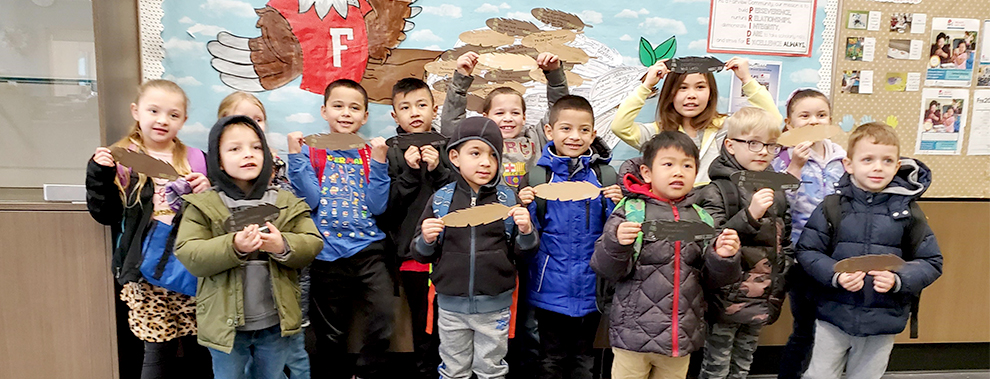 Children in Fairview hallway