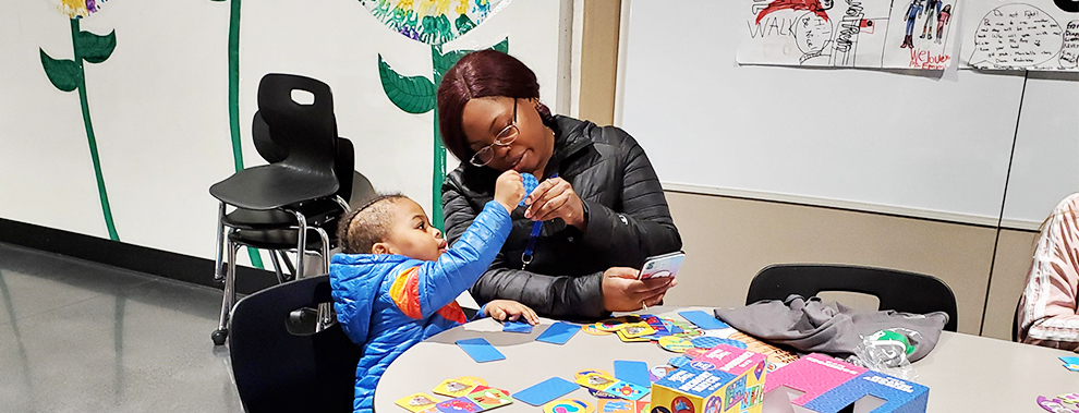 Fairview parent and child at table