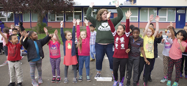 Glenfair group of kids with teacher cheering