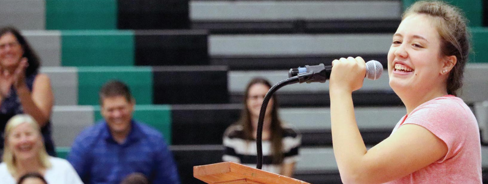 Girl talking with microphone