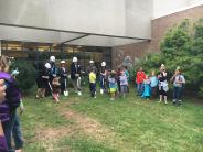 Sweetbriar students gather around the School Board and Superintendent for the ceremonial groundbreaking on the secure vestibule upgrades