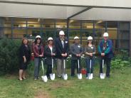 RSD Superindentent, Chair of Citizens for Safe Reynolds Schools (Valerie Tewksbury), and Board Members gather for the secure vestibules construction kickoff