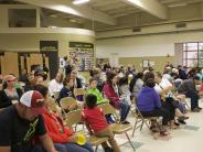 Parents and students gather for the groundbreaking ceremony