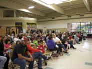 Parents and students gather for the groundbreaking ceremony