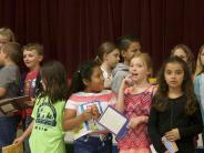 Sweetbriar students get ready to perform their new school song