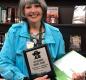 Susan Bowker with award